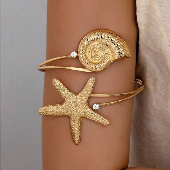 Anthropologie Other - Gold Starfish bracelet Q493